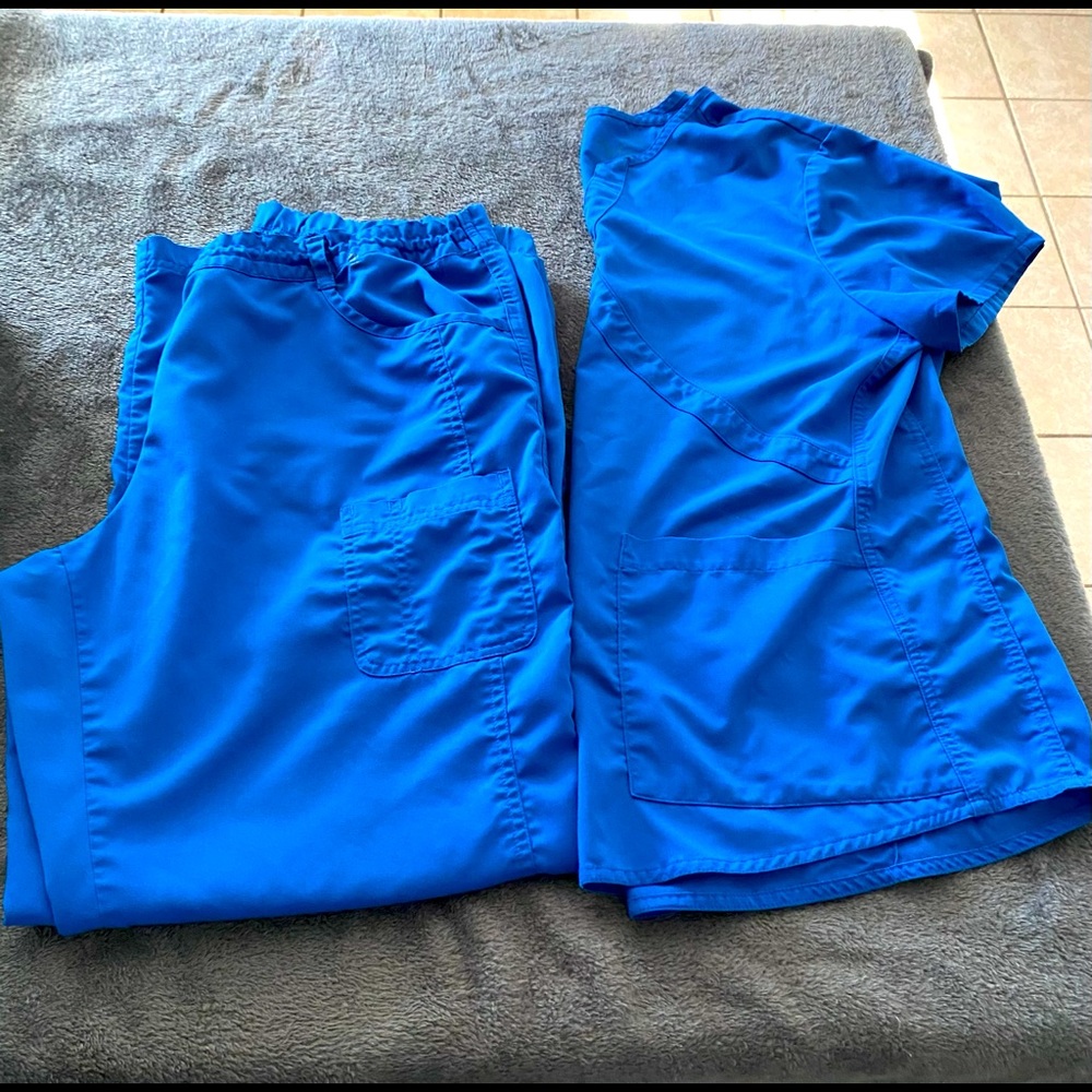 NRg blue scrubs set worn but still has life